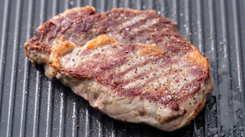 Ribeye cooked over a grill